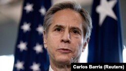 U.S. Secretary of State Antony Blinken speaks at a welcome ceremony after arriving at the State Department in Washington on January 27.