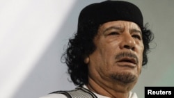 Libyan leader Muammar Qaddafi gives a speech in Rome in August 2010.