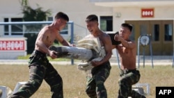 Түндүк Корея армиясынын атайын багыттагы отрядынын аскерлери. 2-октябрь, 2024-жыл.