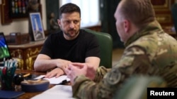 Ukraine on June 1 released an undated photo of President Volodymyr Zelensky (left) and security head Vasyl Malyuk in Kyiv following what Zelenskyy called and "absolutely brilliant outcome."