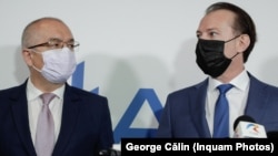 Președintele Asociație Municipiilor din România, Emil Boc, solicită ca Guvernul să aloce peste 1 miliard de lei pentru a acoperi factura la încălzire. Imagine cu Emil Boc (stânga) și Florin Cîțu (dreapta).