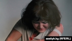 Үй-бүлөдөгү зомбулукка каршы өткөн акцияда тартылган сүрөт