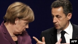 German Chancellor Angela Merkel (left) with French President Nicolas Sarkozy