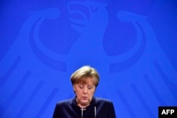 "It would be especially hard for us all to bear if it were confirmed that [the] person who committed this act was someone who sought protection and asylum,” in Germany, Chancellor Angela Merkel said on December 20.