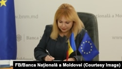 Guvernatoarea BNM, Anca Dragu, semnează cererea de aderare a Republicii Moldova la Zona Unică de Plăți în Euro (SEPA), Chișinău, 30 ianuarie 2024.