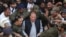 Former Pakistani Prime Minister Nawaz Sharif arrives at a court in Lahore on October 11.