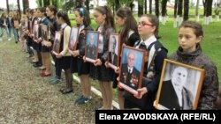 What began as a grassroots initiative has evolved into a quasi-official mass demonstration of patriotism and support for the government.