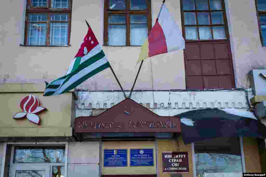 The flags of Georgia's breakaway regions of Abkhazia and South Ossetia fly in front of an office in Tiraspol. Those regions, along with Nagorno-Karabakh, are the only territories that recognize the independence of Transdniester.