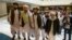 FILE: Mullah Abdul Ghani Baradar, the Taliban group's top political leader, third from left, arrived with other members of the Taliban delegation for talks in Moscow in May 28.
