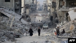 Palestinienii spun că este greu să se recupereze cadavre într-o enclavă făcută una cu pământul de bombardamentele israeliene. Israelul îi acuză că vor să folosească chestiunea ca pârghie de negociere.