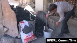 Көмүр сатуучу жай.