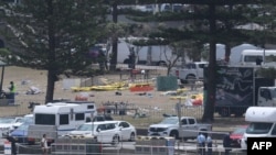 სიდნეიში ხანუქის აღნიშვნის ადგილი შეიარაღებული თავდასხმიდან მეორე დღეს, 15 დეკემბერს