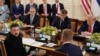 Ukrainian President Volodymyr Zelenskiy at a table with U.S. President Donald Trump, French President Emmanuel Macron, British Prime Minister Keir Starmer, and Finnish President Alexander Stubb (facing away) in talks at the White House on August 18, 2025.