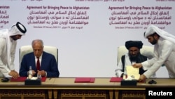 امضای توافقنامه صلح میان نمایندگان امریکا و طالبان در قطر