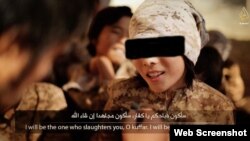 Скриншот видеоролика, размещенного в Интернете, в котором показаны дети отправившихся на "джихад" в Сирию выходцев из Казахстана.
