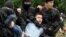 Задержания участника акции протеста в Алматы в день выборов. 9 июня 2019 года. 