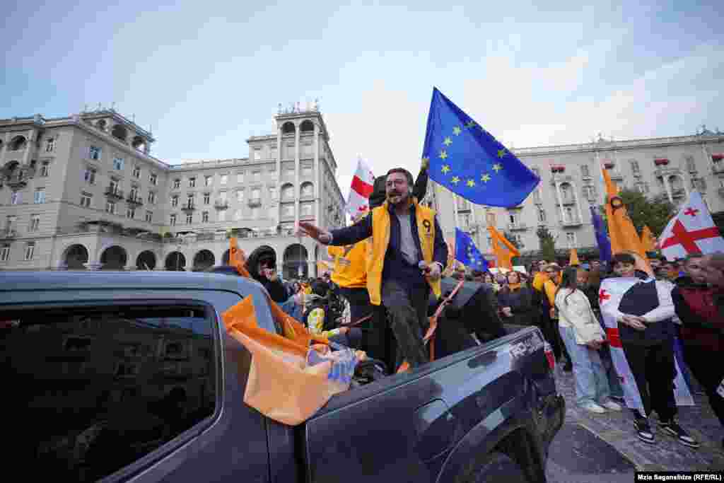 Supporters of Georgia's pro-Western and pro-EU opposition groups hold a joint final campaign rally ahead of the upcoming parliamentary elections in&nbsp;Tbilisi on October 20.