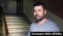 Andrei Kamayev, director of the St. Petersburg-based NGO Veterans of Novorossia, stands in the hallway of his office building on central Nevsky Prospekt.