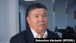 Алмамбет Шыкмаматов.