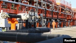 Казакстандагы Кашаган кени. Анда 13 млрд. баррель мунай бар экени аныкталган.