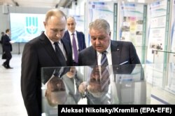 ვლადიმირ პუტინი და მიხაილ კოვალჩუკი