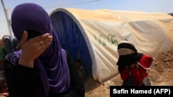 Лагерь для членов семей боевиков ИГИЛ вблизи Мосула. Март 2018 года.