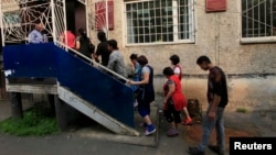 Красноярскта кармалган мигранттар. 7-август, 2013-жыл