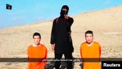 Туткунга түшкөн жапон жарандары.