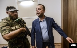 Олександр Бородай (праворуч)