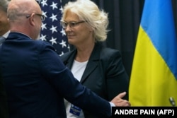 ქრისტინე ლამბრეხტი და ოლეკსი რეზნიკოვი