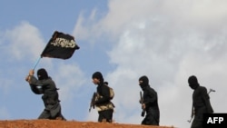 Бойцы ИГ в Сирии.