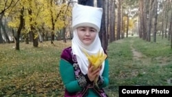 Ызат Тургунбаева.