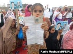 In the PTM's April 8 gathering thousands of women, children, and men held up photos, placards, or the national ID cards of their missing family members.