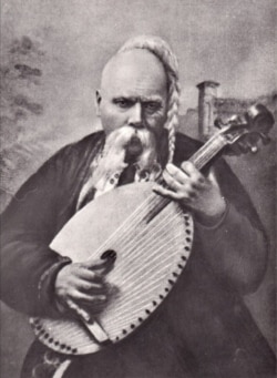 Марко Кропивницький у ролі Коваля у виставі «Невольник» за п’єсою М. Кропивницького (твір написано за мотивами однойменної поеми Тараса Шевченка)