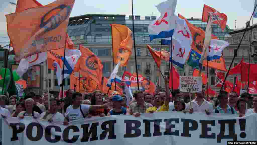 A banner carried by the opposition Solidary Movement declared "Russia Forward!"