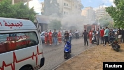 په لبنان کې د پیجرونو د چاودنو له کبله له سیمې لوګي پورته کېږي.