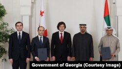 თორნიკე რიჟვაძე, ლევან დავითაშვილი, ირაკლი კობახიძე, შეიხი მუჰამედ ბინ ზაიედ ალ-ნაჰიანი და მუჰამედ ალი ალაბარი