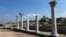 The ruins of an ancient basilica (foreground) and the St. Vladimir Cathedral (background) are seen at the Tauric Chersonesos preserve in Sevastopol in 2017.