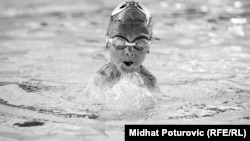 Ismail swims at Sarajevo's Olympic pool. 