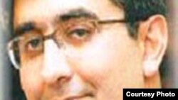 علی فرحبخش، روزنامه نگار ایرانی که به سه سال زندان محکوم شده است.