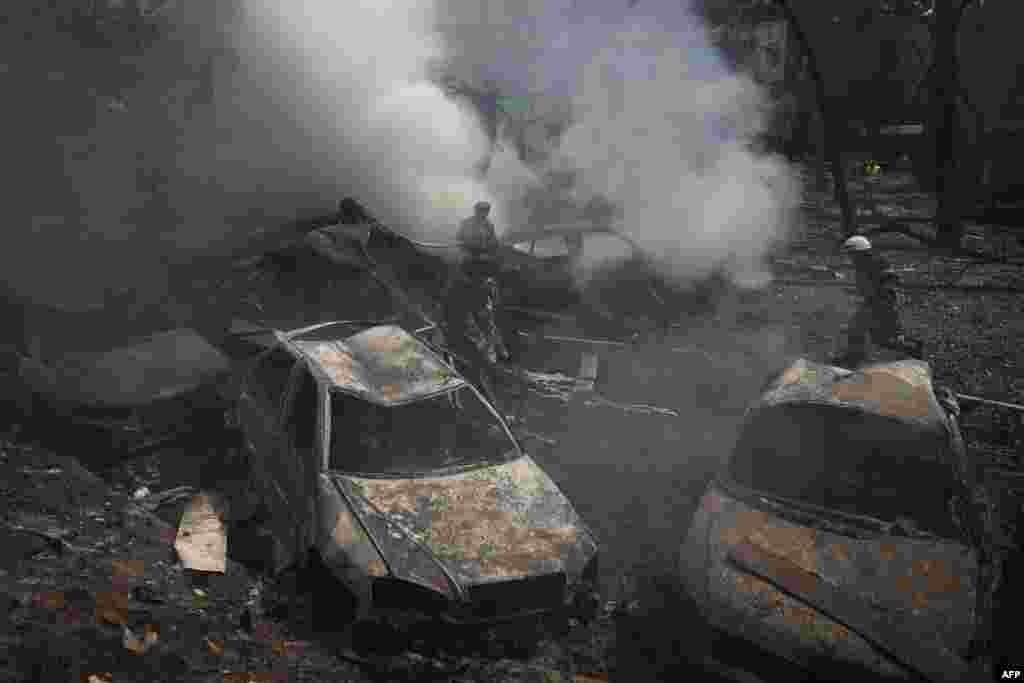 В Минобороны России заявили, что ракетный удар по Украине нанесли в ответ на "попытки нанесения ущерба объектам российской энергетики и экономики". При этом, в российском военном ведомстве вину за погибших и пострадавших в Киеве возложили на украинских военных, фото AFP