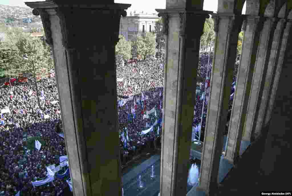 Georgians gather on Rustaveli Avenue in front of the parliament in November 2007, calling for the resignation of President Mikheil Saakashvili.&nbsp; Many protests have taken place along Rustaveli in the 21st century including the &ldquo;Rose Revolution" that swept Mikheil Saakashvili to power in 2003, and the anti-Saakashvili protests in 2007 (pictured) that were violently put down by the controversial pro-Western leader. &nbsp;