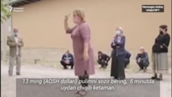 В Намангане погибла женщина, совершившая самосожжение во время принудительного выселения из дома