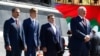 Alyaksandr Lukashenka (right) with his sons (left to right) Viktar, Mikalay, and Dzmitry attend a wreath-laying ceremony marking the anniversary of the victory over Nazi Germany in World War II in Minsk on May 9.