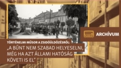 Zsidók gyalogmenete a kőszegi Schey Fülöp utcai gettóból a vasútállomásra 1944. június 18-án. A szombathelyi gettóba történő átszállításuk után, 1944. július 4-én, Auschwitzba deportálták a foglyokat. (Fortepan)