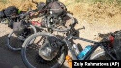 The seven had met while cycling in the region and decided to ride together through a lower route in the picturesque Pamir Mountains. 