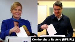 Kolinda Grabar Kitarović i Zoran Milanović prilikom glasanja na izborima 22. decembra