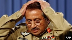 FILE: Former Pakistani military ruler General Pervez Musharraf gestures during a press conference.