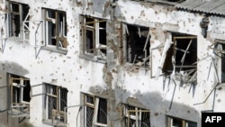 Бесланера номер 1 йолу школа, сурт даьккхина 2004-чу шеран гезгамашин-баттахь