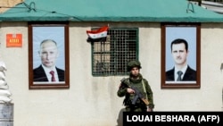 پلیس نظامی ارتش روسیه در تصویری از مارس سال جاری میلادی در پاسگاهی نزدیک دمشق